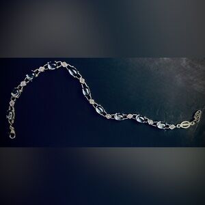 Elegant Sterling Silver and Topaz Women's Tennis Bracelet
